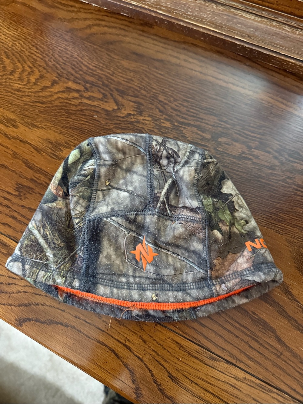 NOMAD mossy oak beanie with reversible orange